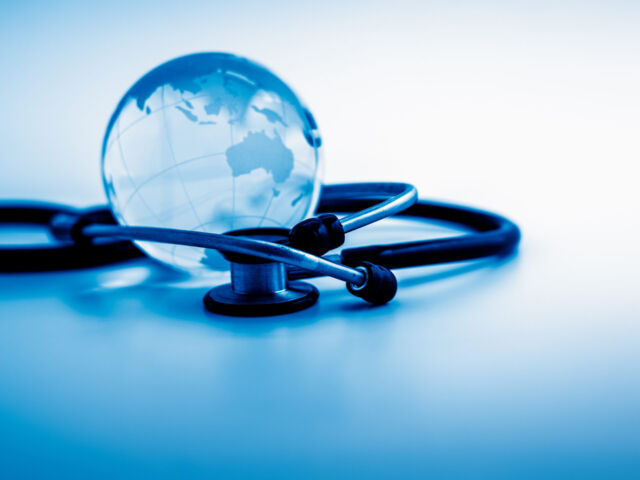 Global,Healthcare.,Globe,And,Stethoscope,,Studio,Shot.blue,Toned,Images.