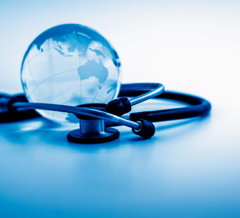 Global,Healthcare.,Globe,And,Stethoscope,,Studio,Shot.blue,Toned,Images.